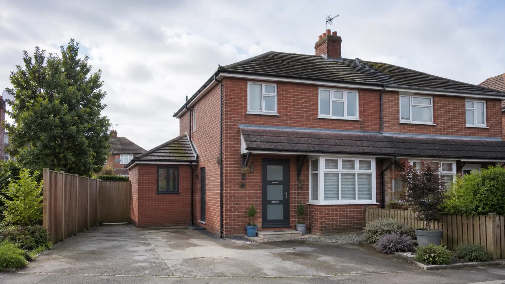 Completed side extension on a UK semi-detached house